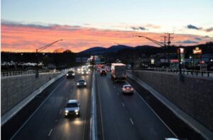 Cars traveling both ways on a road with mountains in the background, that's possibly one of the most dangerous roads in Albemarle County.