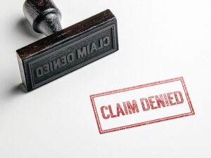 A stamp that says "claim denied"