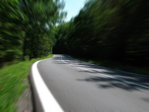 A winding two-lane road.