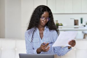 woman reviewing paperwork
